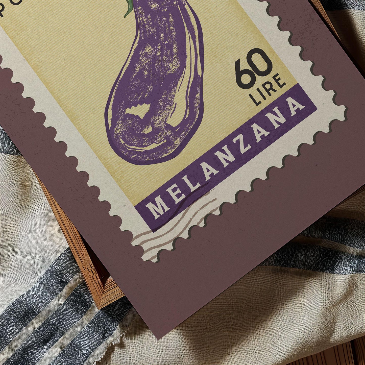 a stamp with a picture of a purple eggplant