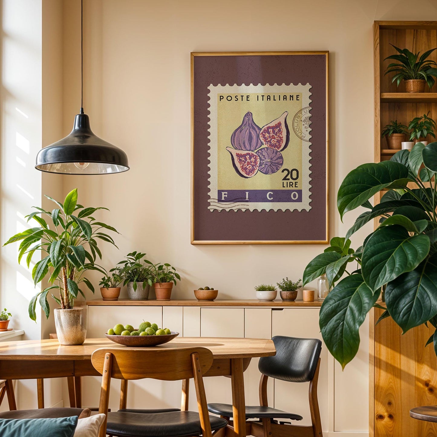 a cozy dining area with a wooden table, chairs, and a potted plant. A framed stamp with a purple and pink design hangs on the wall above the table, and a hanging light fixture illuminates the space.