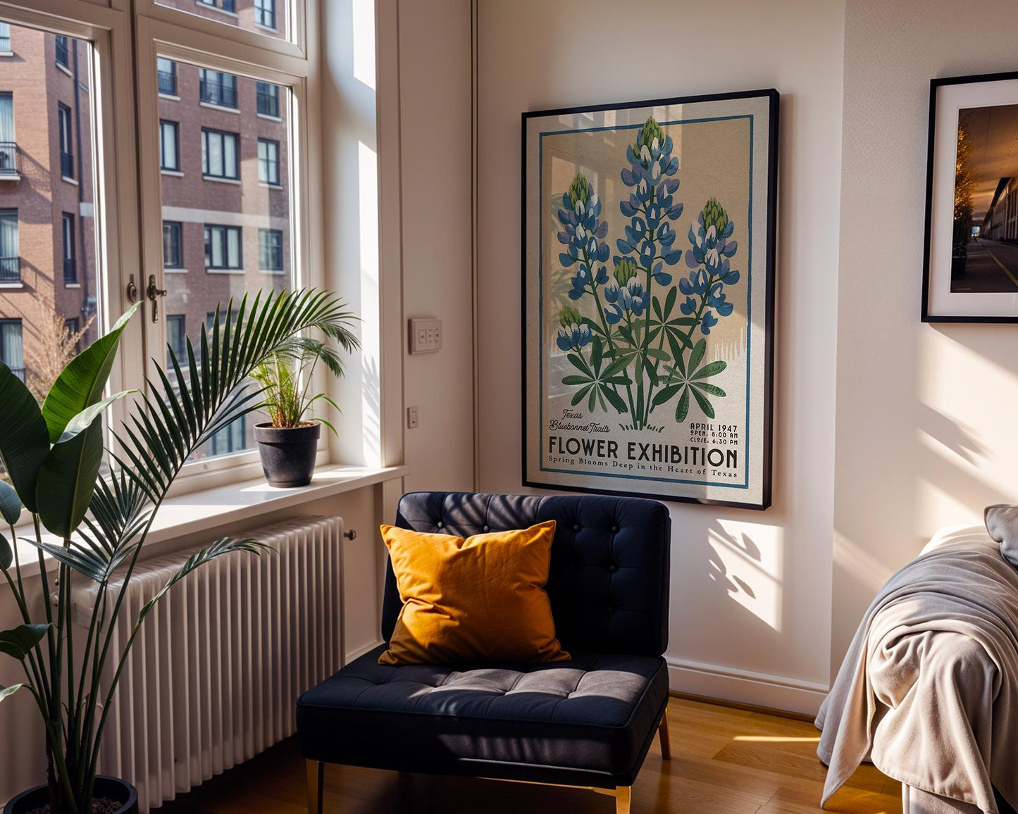 a room with a chair and a poster on the wall