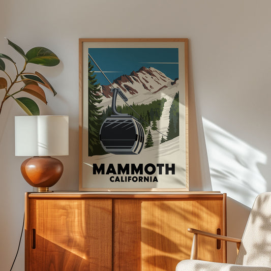 a framed poster of a ski lift in the background, with the text "MAMMOTH CALIFORNIA" prominently displayed.