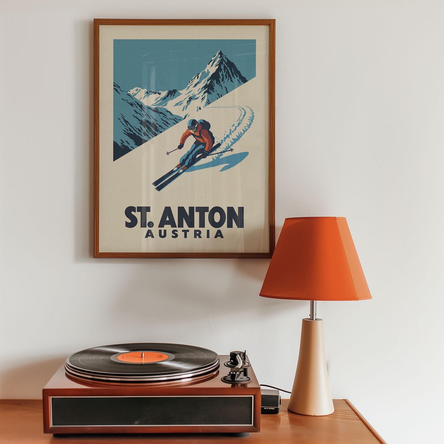 a record player sitting on top of a wooden table