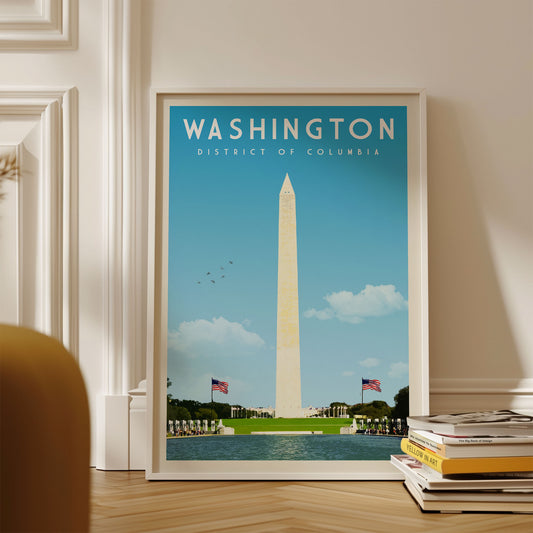 A framed poster of Washington, D.C., with the Washington Monument and the National Mall in the background, is displayed on a wall.