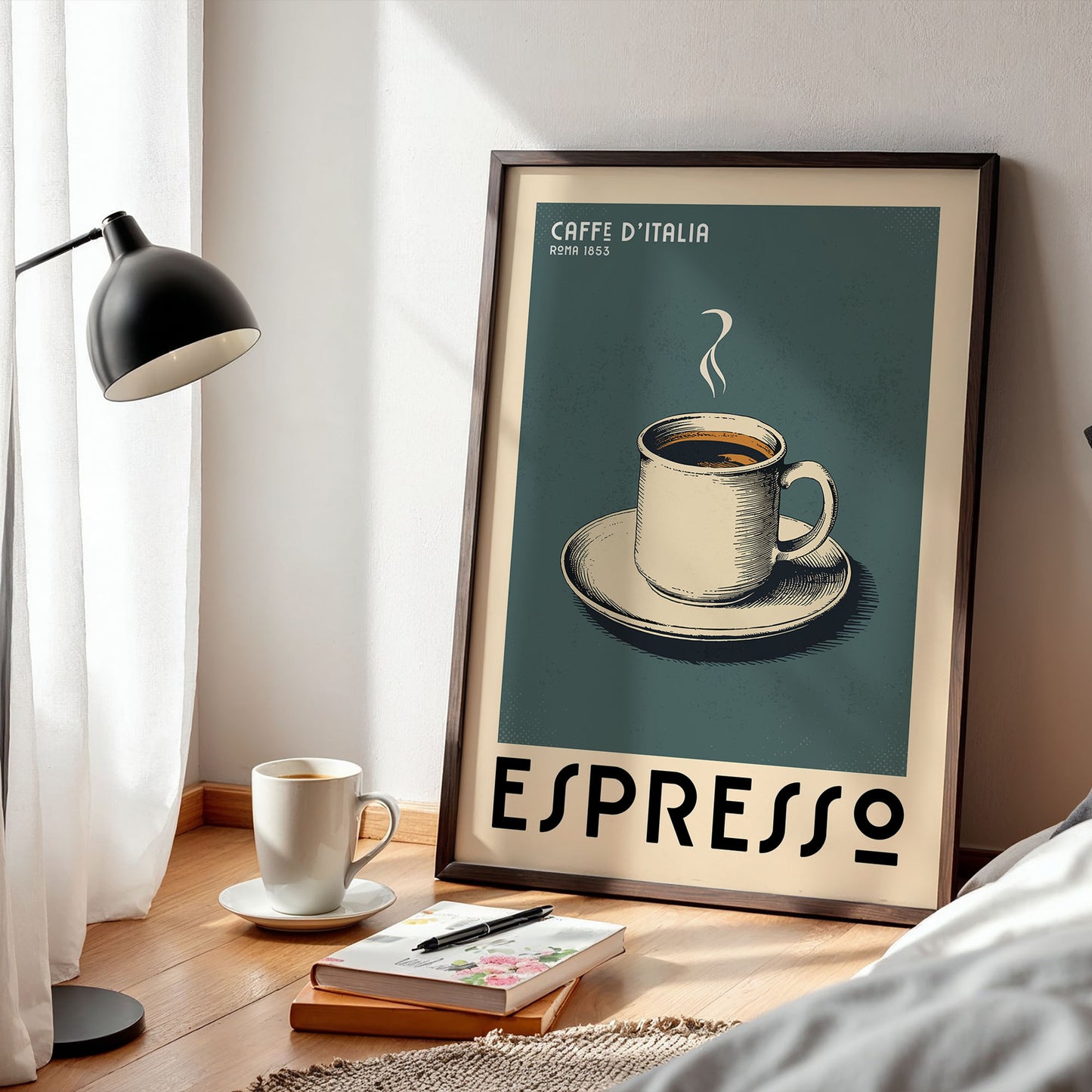 a framed poster of a cup of espresso, a lamp, a book, and a notebook on a wooden floor.