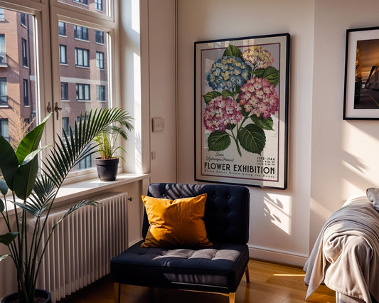 a room with a chair and a poster on the wall