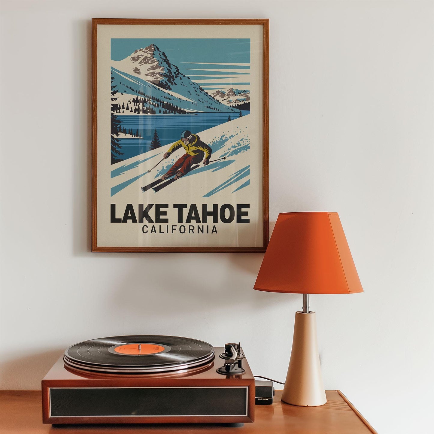 a record player sitting on top of a wooden table