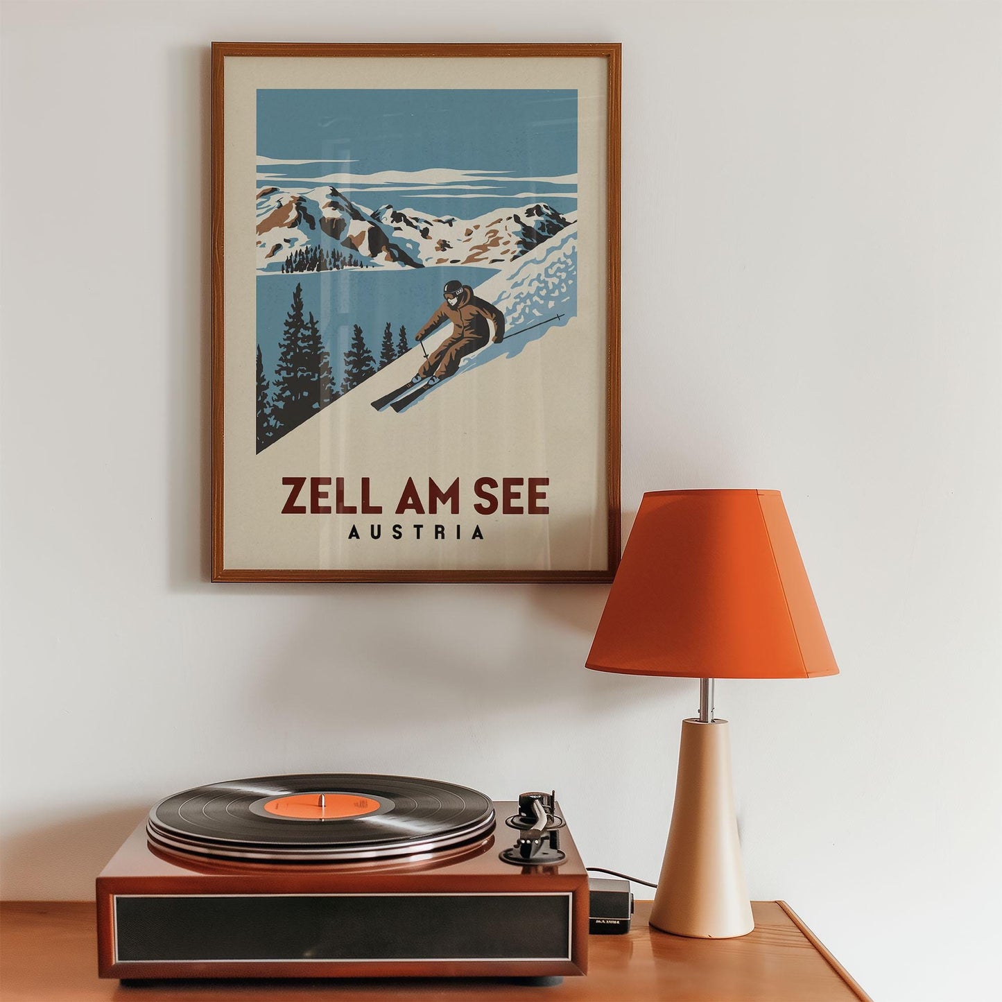 a record player sitting on top of a wooden table