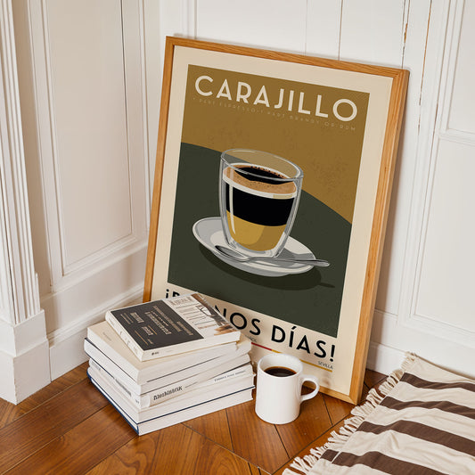 a framed poster of a cup of coffee with a stack of books and a white mug on the floor in front of it.