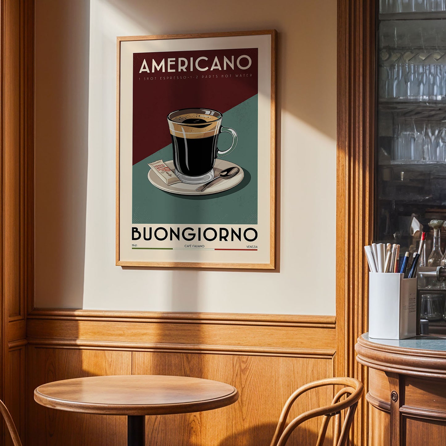 a framed poster of a cup of espresso coffee on a table, with the text "AMERICANO" and "BUONGIORNO" prominently displayed.