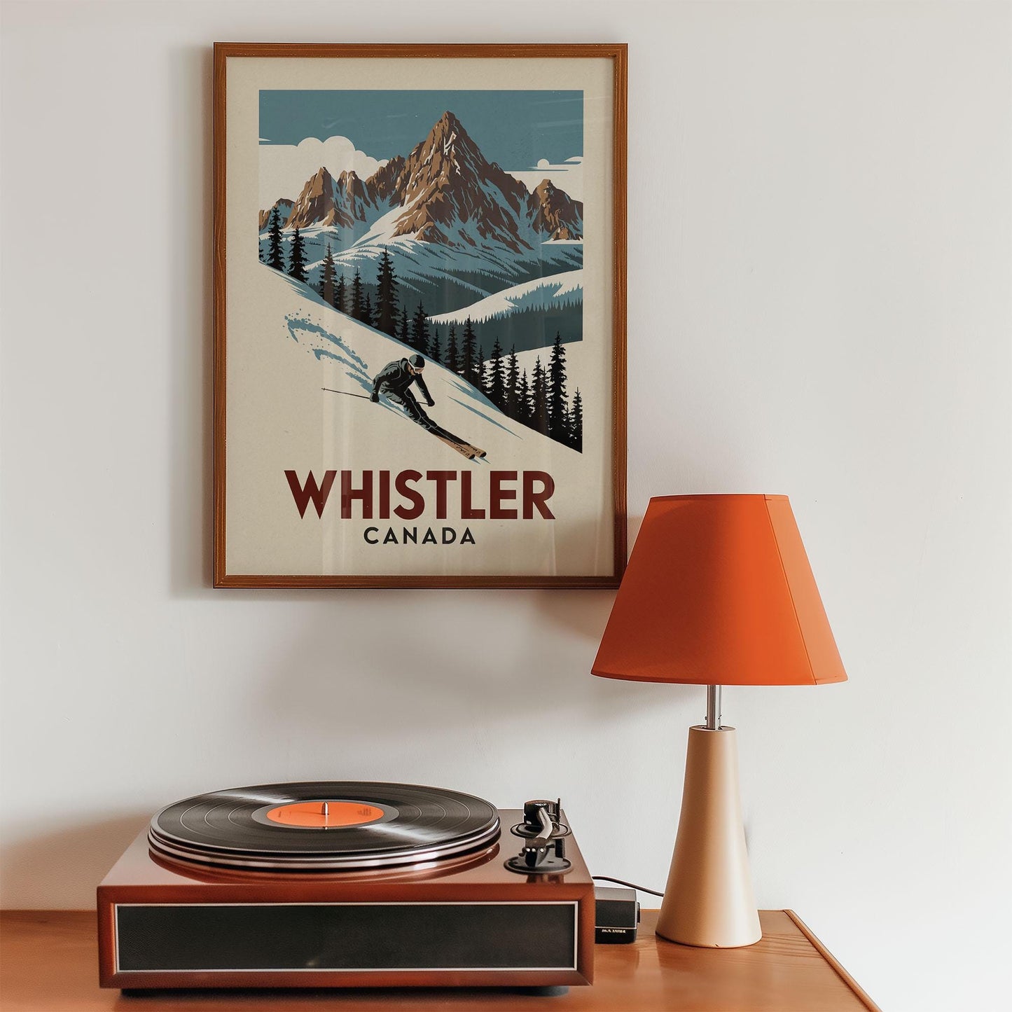 a record player sitting on top of a wooden table