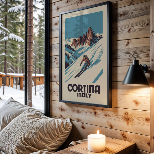a cozy cabin interior with a framed poster of a skier on the wall, a lit candle on a wooden nightstand, and a view of a snowy forest through a window.