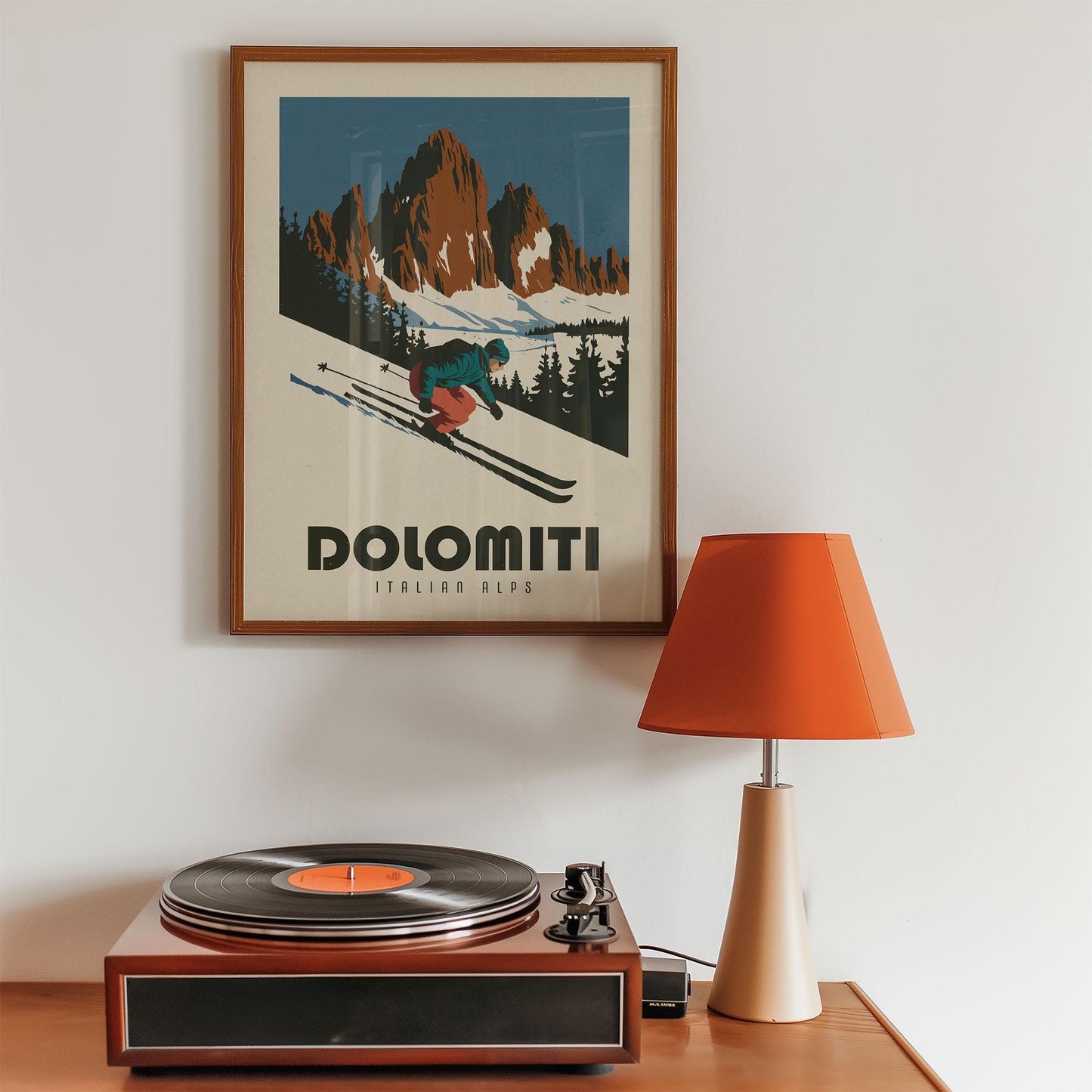 a record player sitting on top of a wooden table