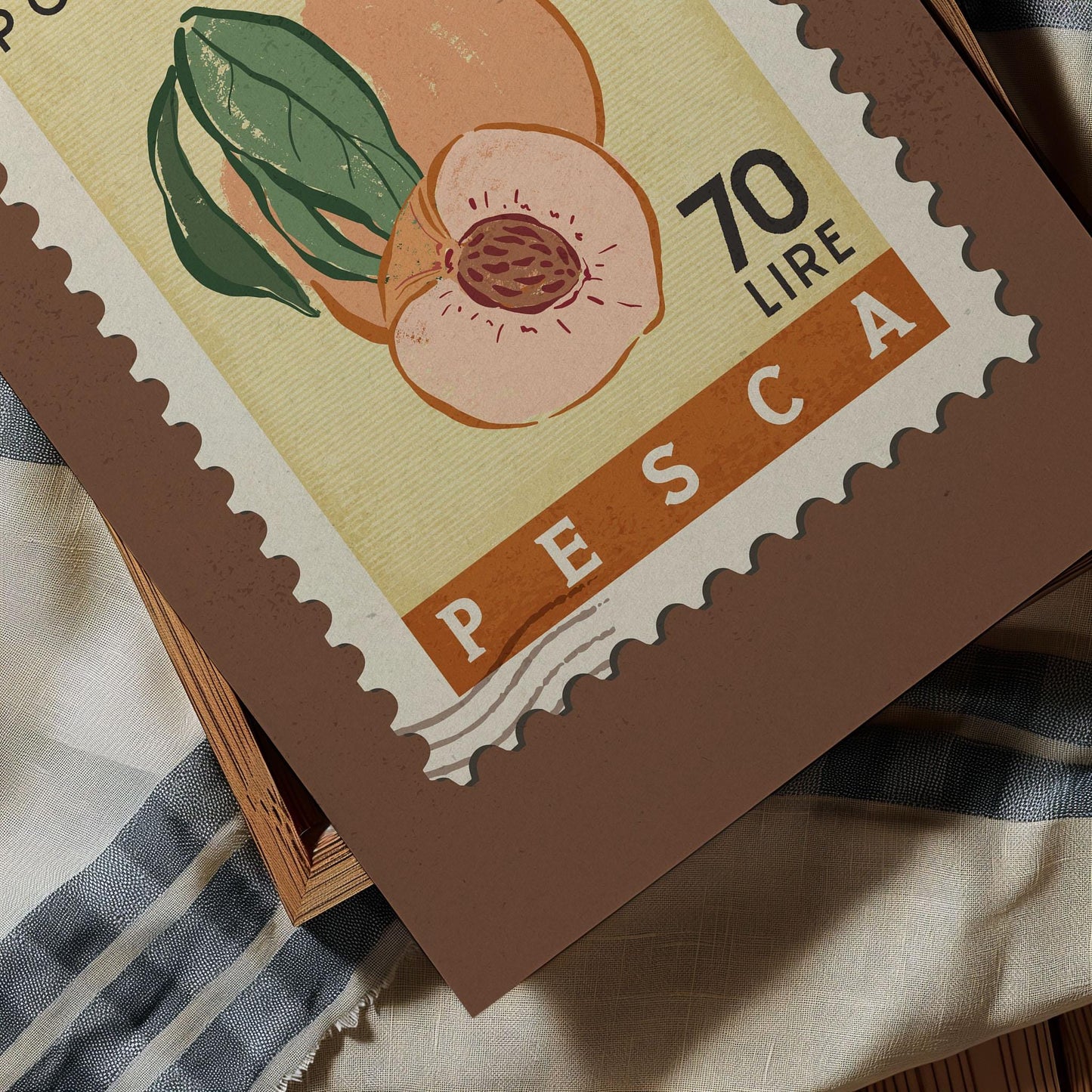 A close-up of a postage stamp featuring an illustration of a peach and the word "PESCA" printed on it.
