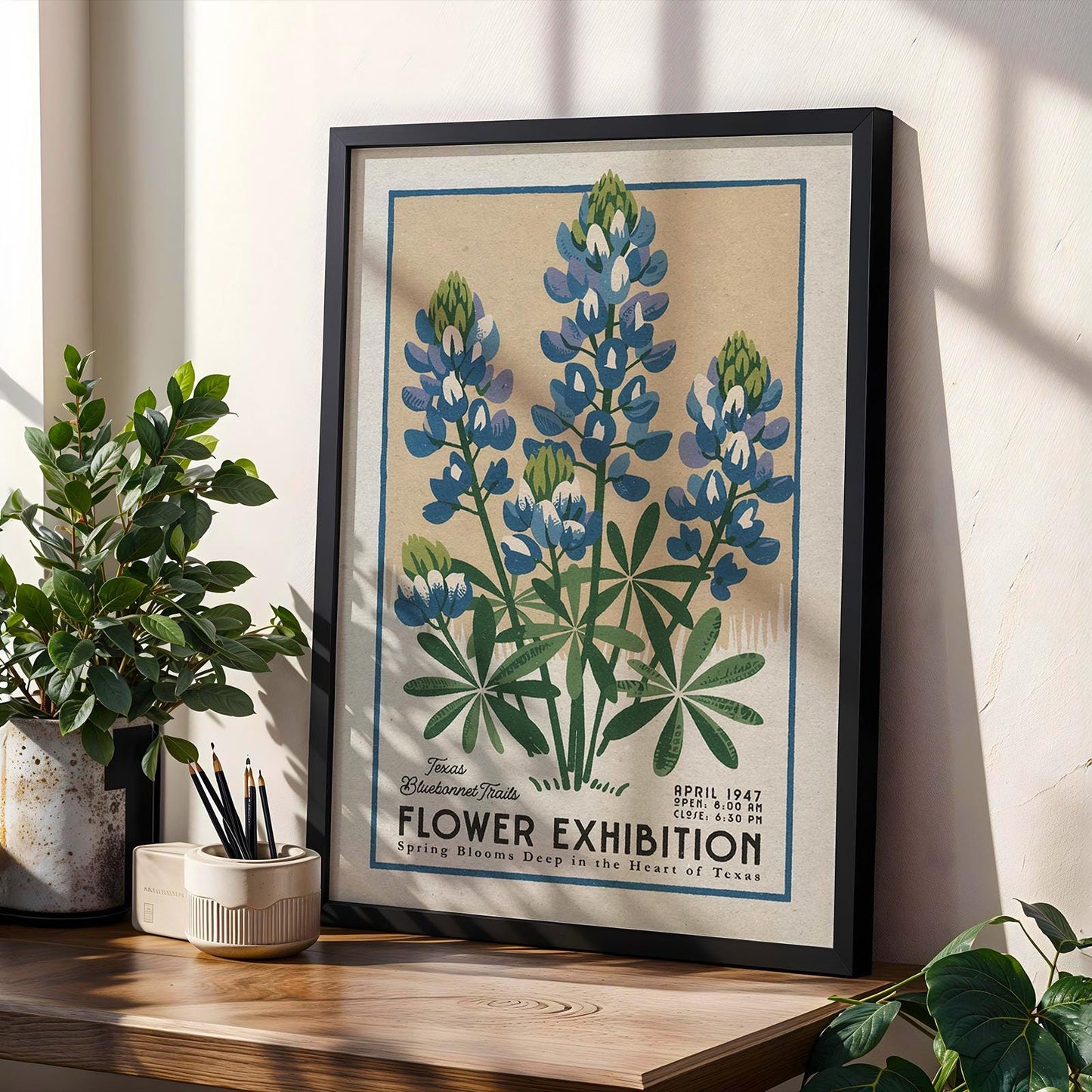 a picture of a flower exhibition on a shelf next to a potted plant