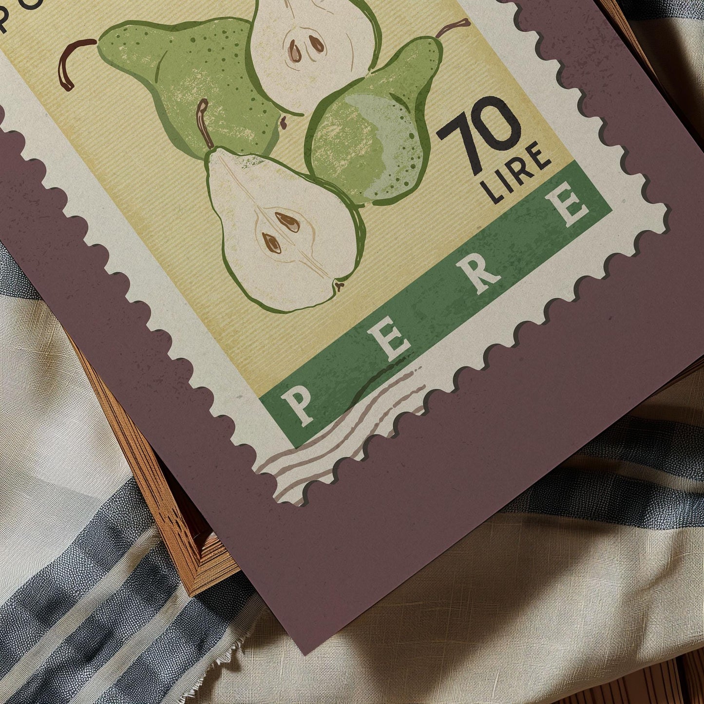 A postage stamp featuring a close-up of pears, with the word "PERE" prominently displayed.