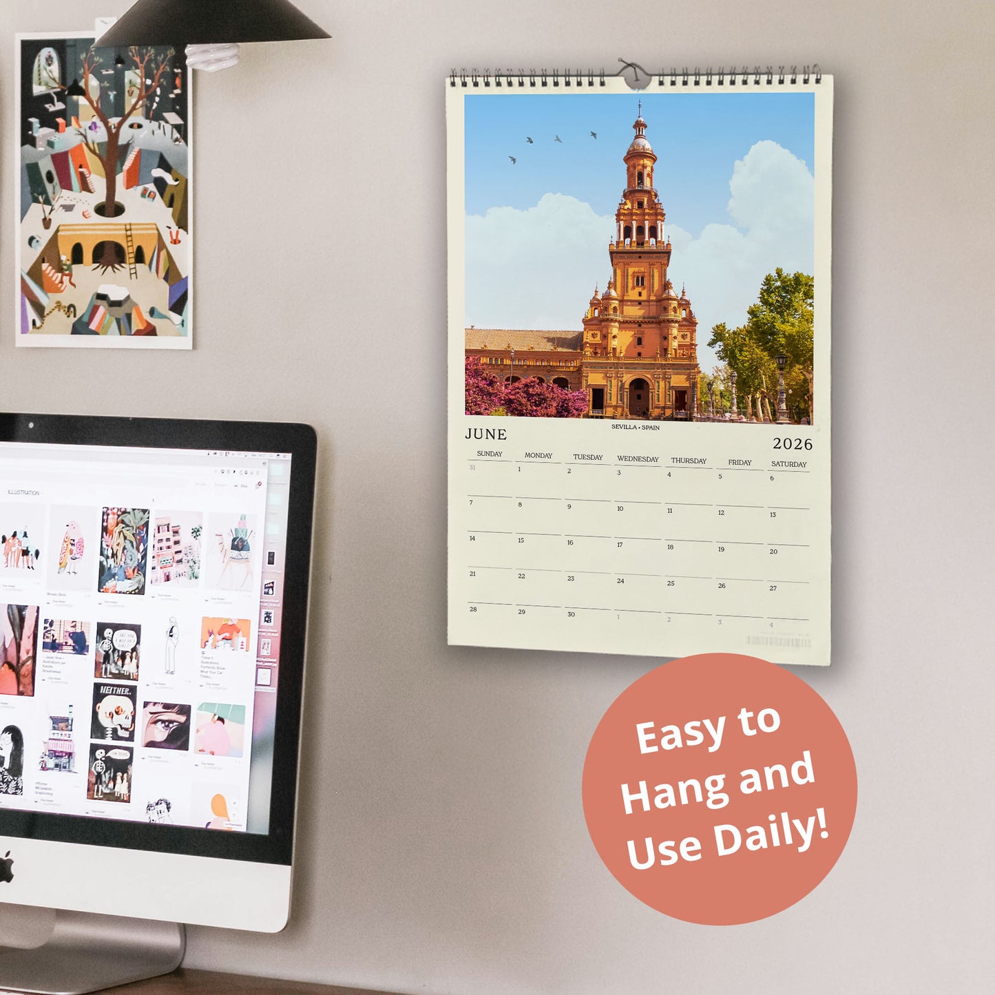 a wall with a calendar and a computer monitor, along with a few other items. The calendar displays a photo of a tall building, and the computer monitor shows a webpage with various images. There is also a text overlay that reads "Easy to Hang and Use Daily!"