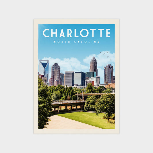 A poster of the Charlotte, North Carolina skyline, featuring the city's iconic skyscrapers and a bridge over a park.