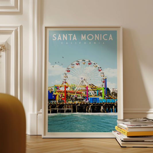 A framed poster of the iconic Santa Monica Ferris wheel in California, with a colorful and vibrant image of the amusement park.