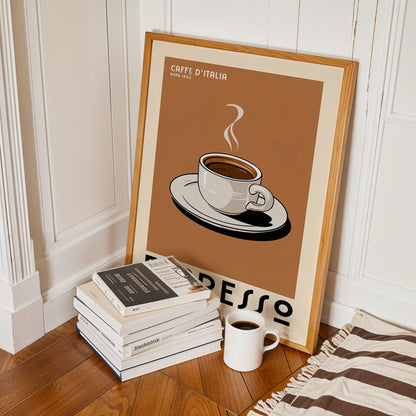 a framed poster of a cup of espresso, a stack of books, and a white mug on a wooden floor.