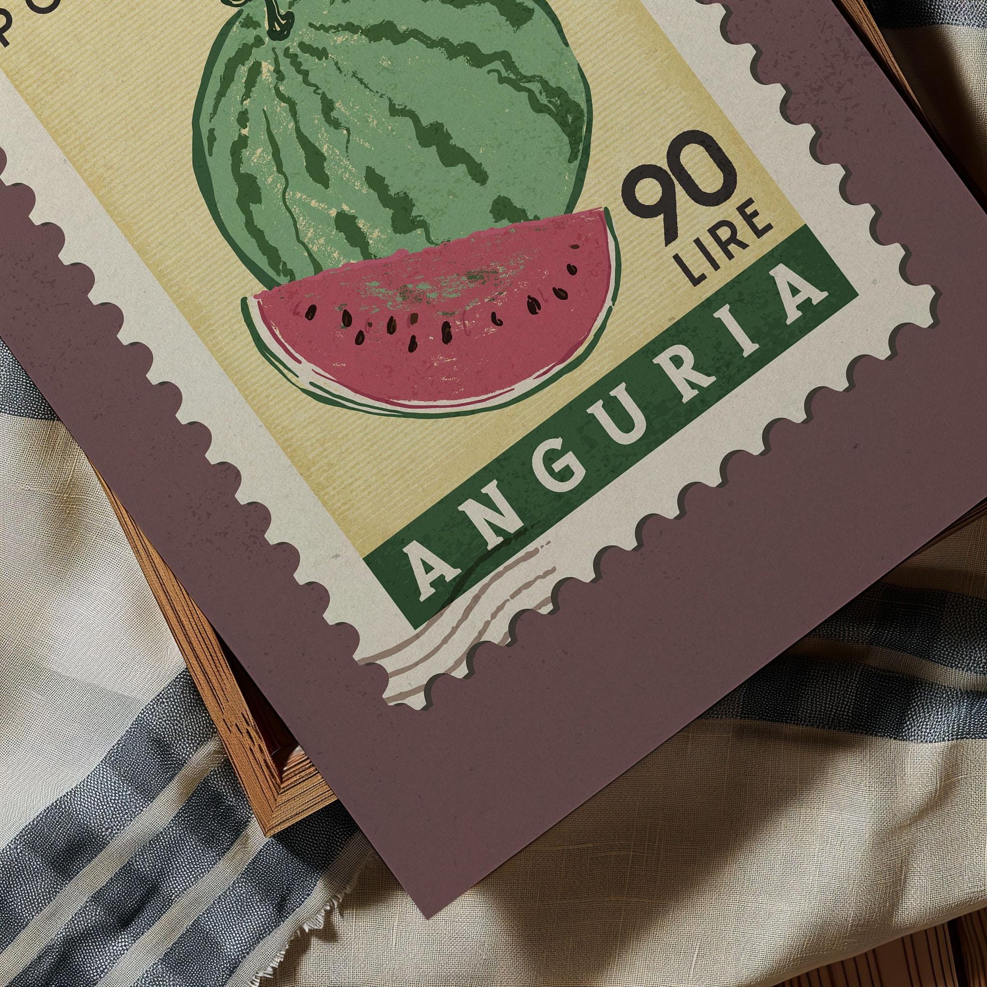 A postage stamp from Anguria, featuring a watermelon illustration and the text &quot;90 Lire&quot;.