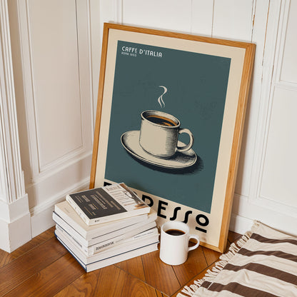 a framed poster of a cup of espresso, a stack of books, and a white mug on a wooden floor.