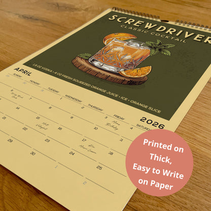 A calendar for April featuring a Screwdriver cocktail with an illustration of a glass and orange slices.