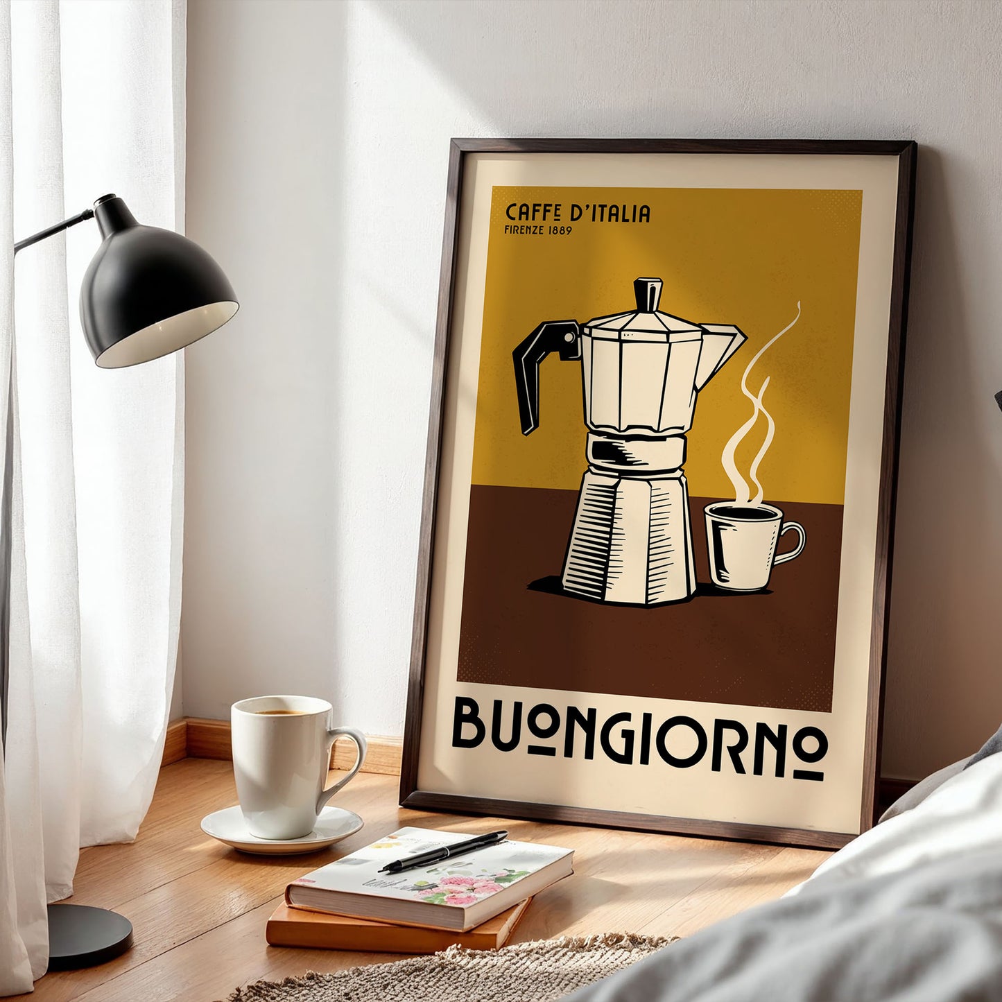 a framed poster of a coffee maker with a cup of coffee next to it, placed on a wooden floor near a lamp and some books.