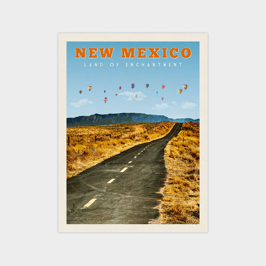 The image is a poster for New Mexico, featuring a road leading to a desert landscape with mountains in the background. The road is lined with hot air balloons, creating a colorful and festive atmosphere.