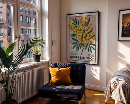 a room with a chair and a poster on the wall