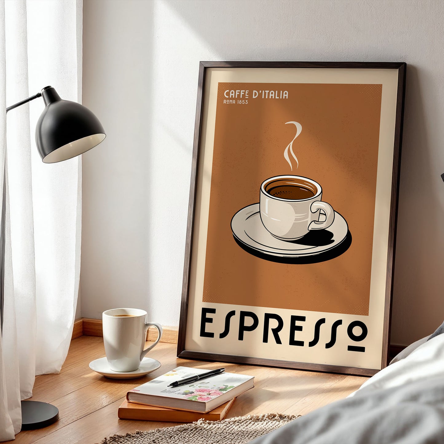 a framed poster of a cup of espresso, with a lamp and a book on a wooden floor in the foreground.