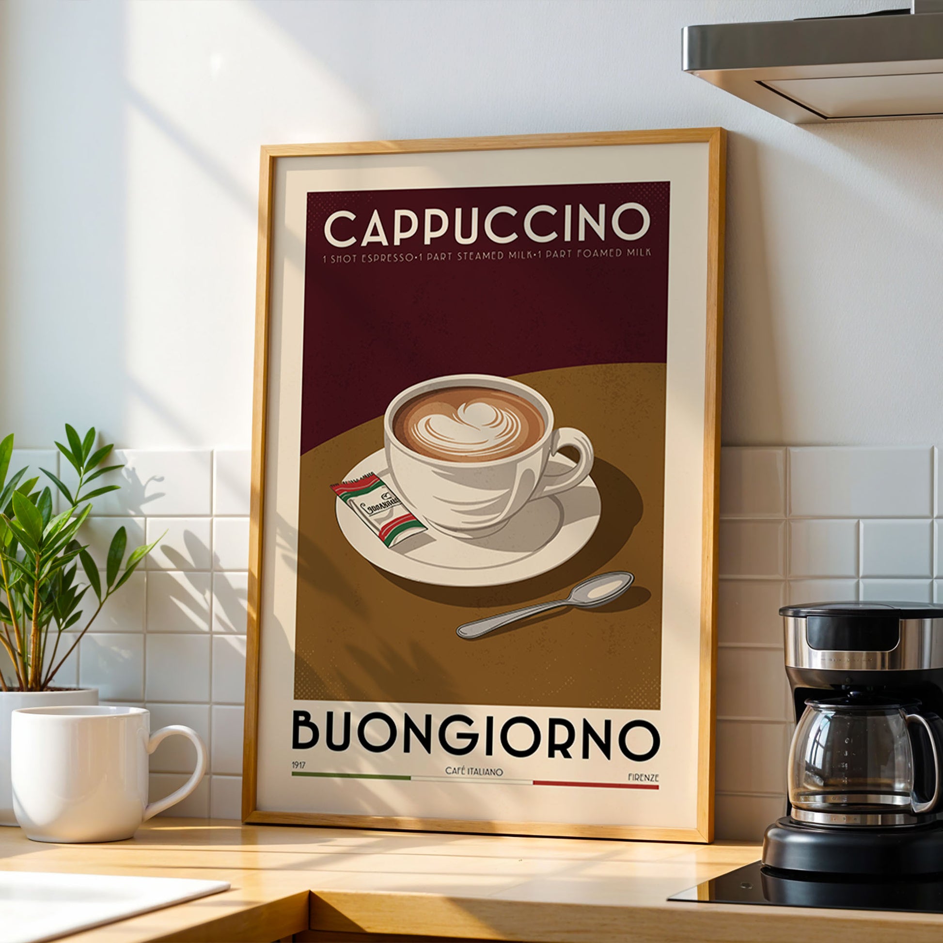 a framed poster of a cup of cappuccino, with a coffee machine and a plant in the background.
