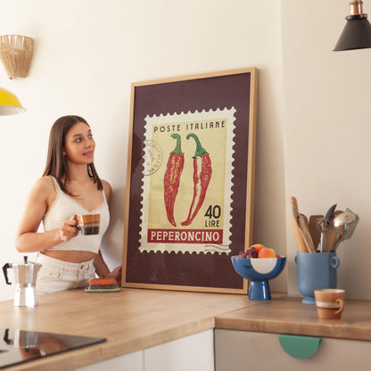 a woman standing in a kitchen next to a poster