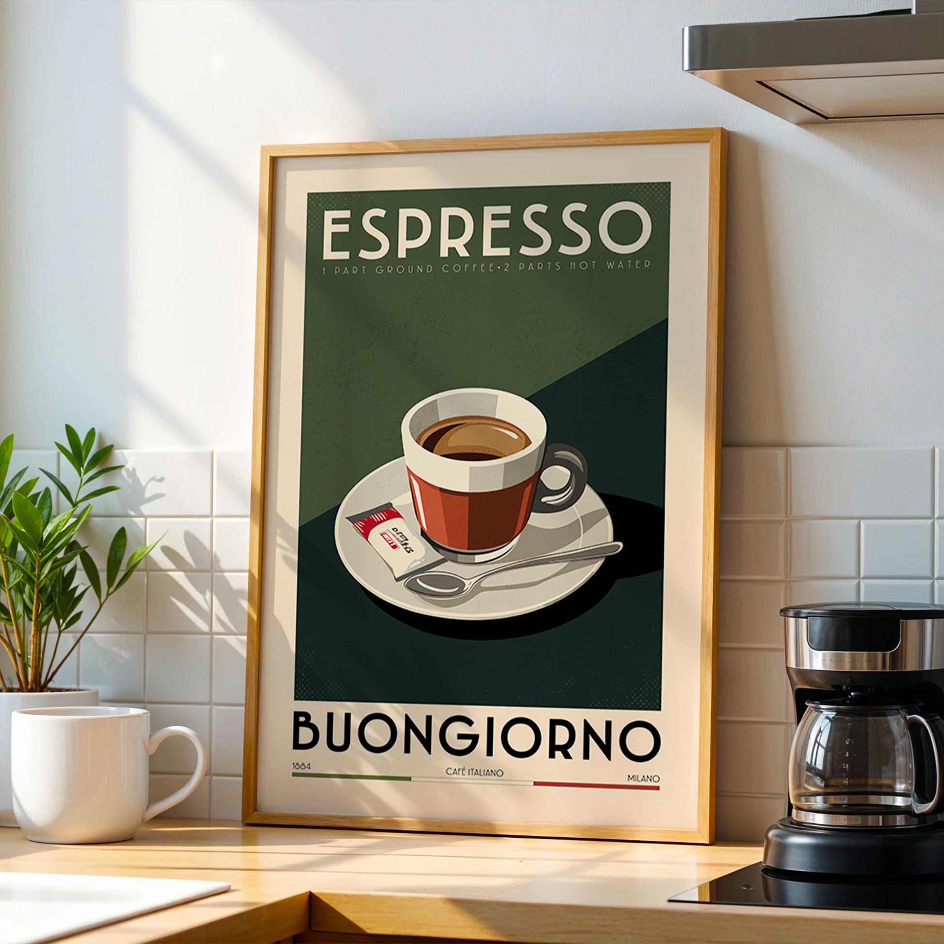 a framed poster of a cup of espresso with the text "ESPRESSO" and "BUCKGIORNO" printed on it, along with the text "1 PINT GROUND COFFEE - 2 POUNDS HOT WATER" and "1940 - CANTINA - ITALIA" printed below. The poster is displayed on a kitchen counter, with a coffee maker and a potted plant visible in the background.