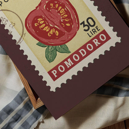 a stamp with a picture of a tomato on it