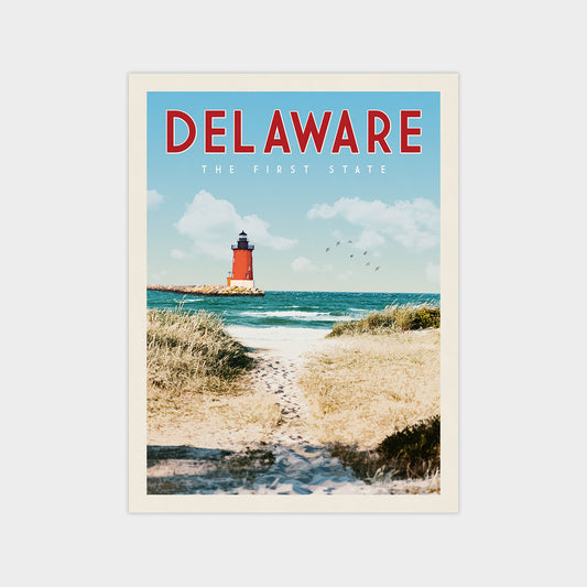 A poster of a lighthouse on a beach with a clear blue sky and ocean in the background.