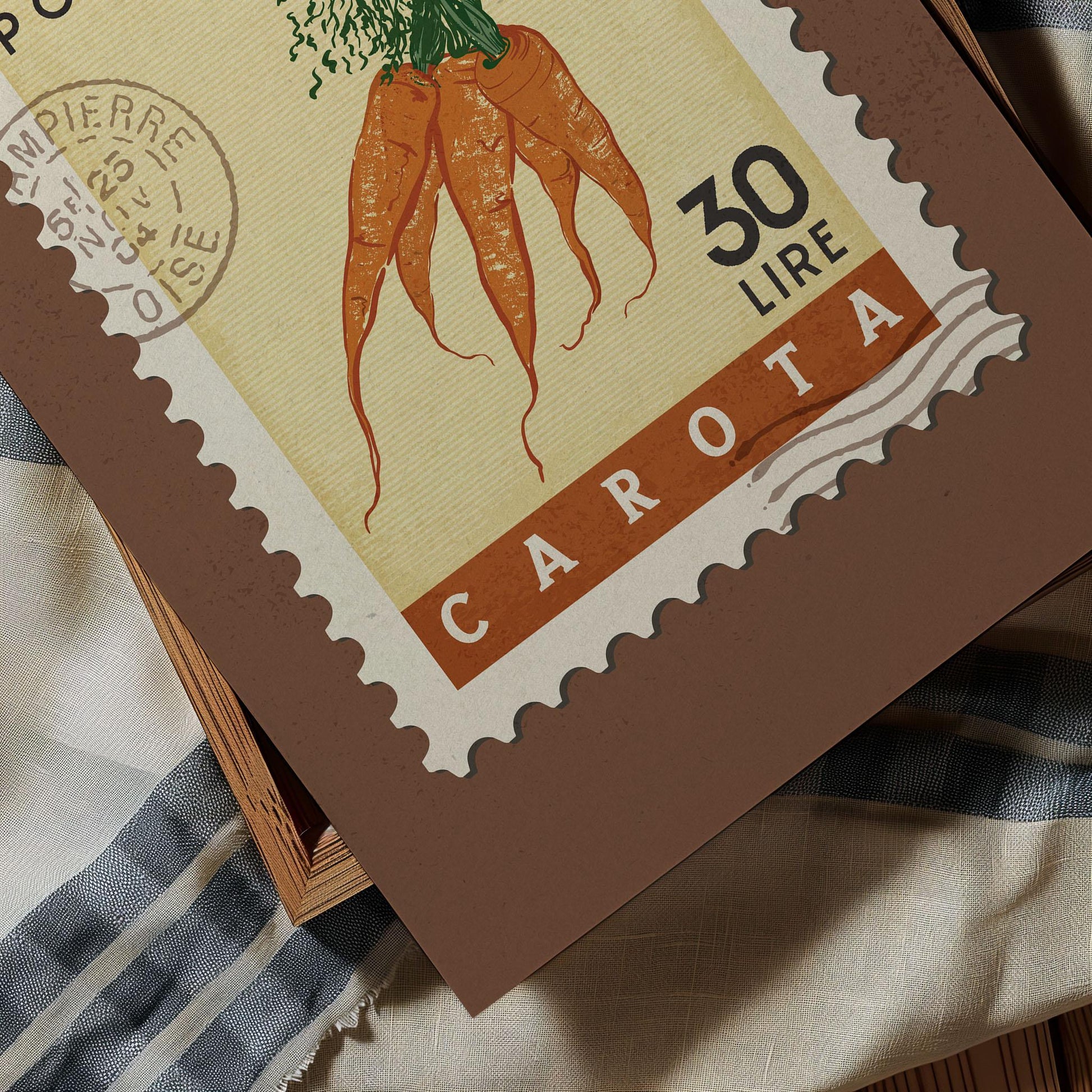 a close up of a stamp with a carrot on it