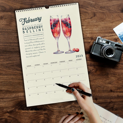 a calendar with two glasses of wine and a camera