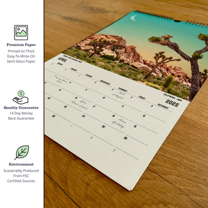 a desk calendar with a picture of a tree on it