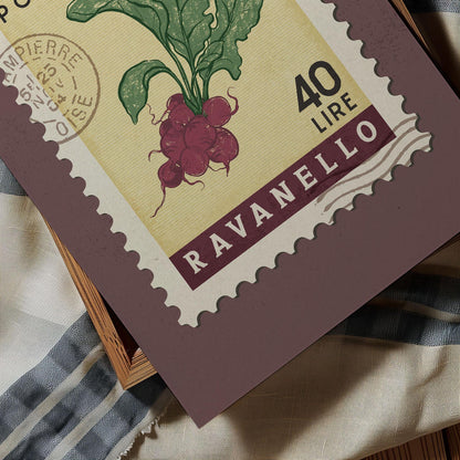a close up of a stamp with a plant on it