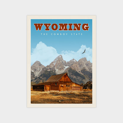 A vintage-style poster of Wyoming, featuring a wooden cabin in the foreground with mountains in the background.