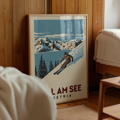 A framed poster of a skier in a snowy mountain landscape, with the text "LAM SEE" and "Austria" below the image.
