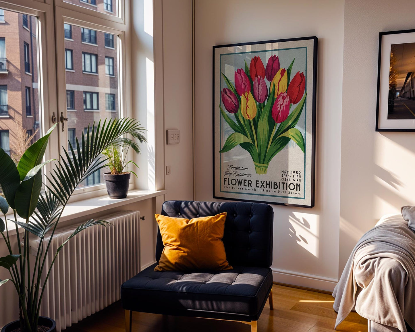 a room with a chair and a poster on the wall
