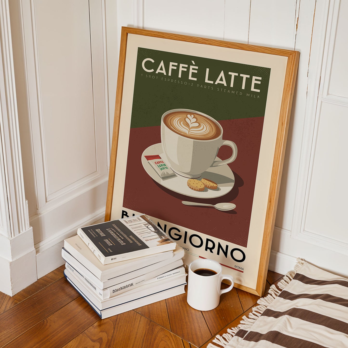 a framed poster of a cup of cappuccino, along with a stack of books and a mug of coffee on a wooden floor.