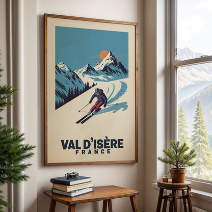 a framed poster of a skier on a snowy mountain, with the text "VAL D'ISÉRE FRANCE" below the illustration.
