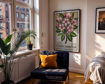 a room with a chair and a poster on the wall