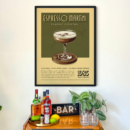 a framed poster of an espresso martini cocktail hanging on a wall above a wooden bar counter with various liquor bottles and glasses.