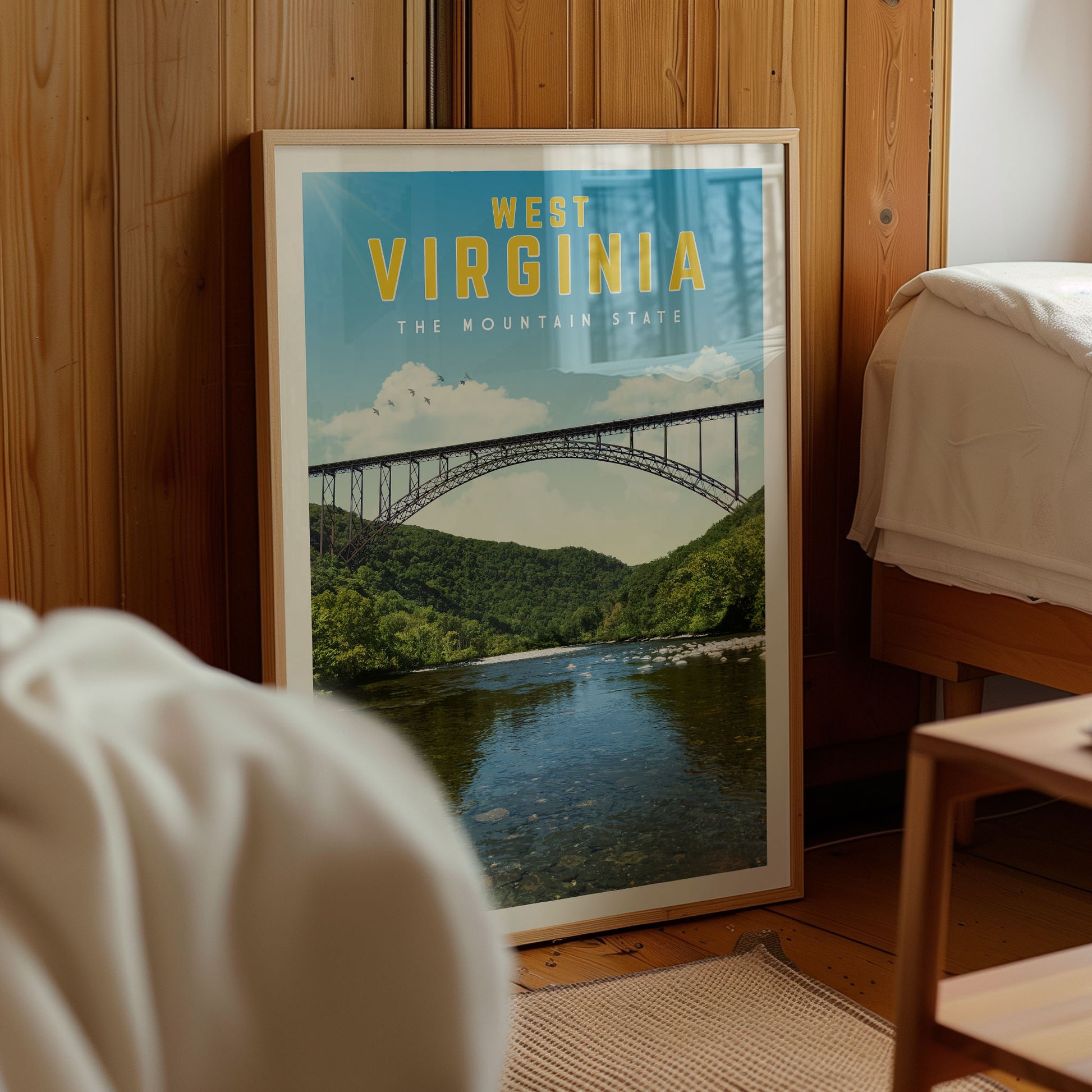 A framed poster of the West Virginia mountain bridge, with a scenic view of the bridge and the surrounding landscape.