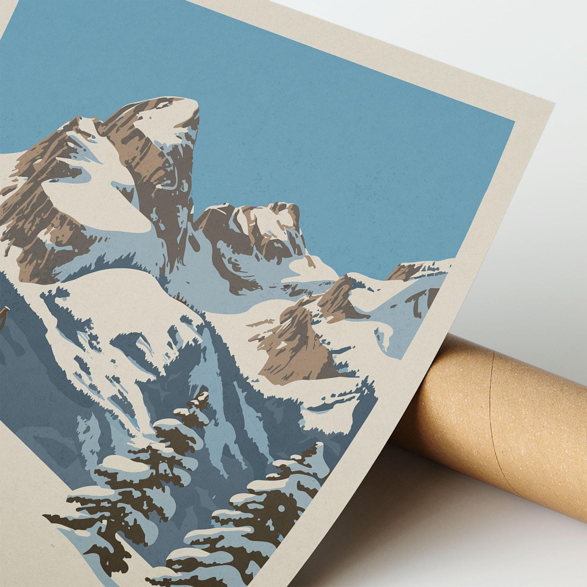A close-up of a printed illustration depicting a snowy mountain landscape with a clear blue sky.