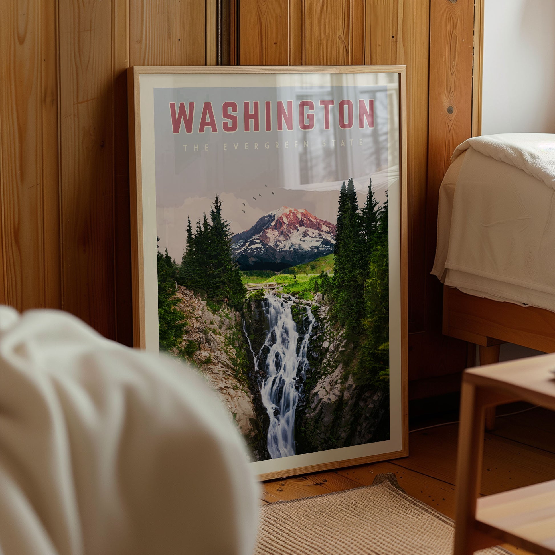 A framed poster of a waterfall and mountain landscape in Washington State, with the text "WASHINGTON THE EVERLASTING" prominently displayed.
