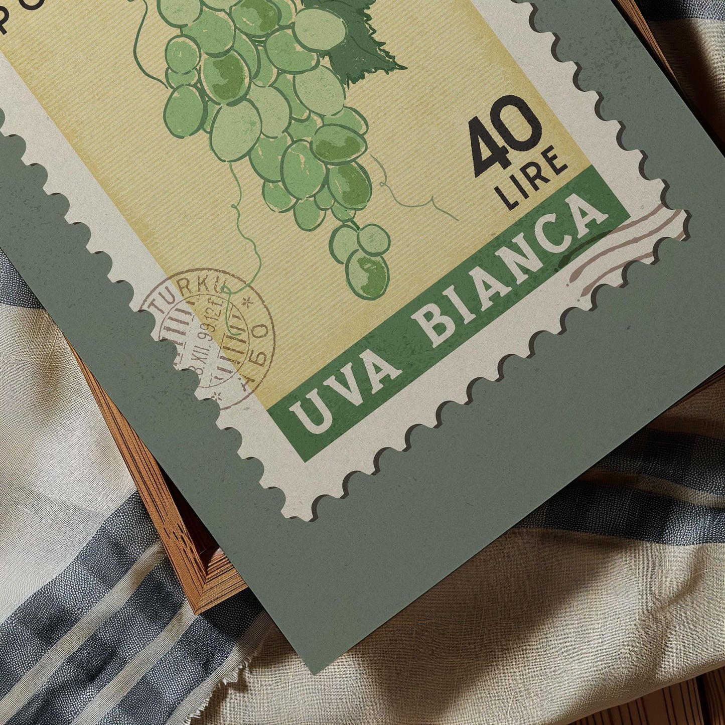 The image is a close-up of a postage stamp featuring a grape vine illustration. The stamp has a value of 40 lire and is from the country of Bianca.