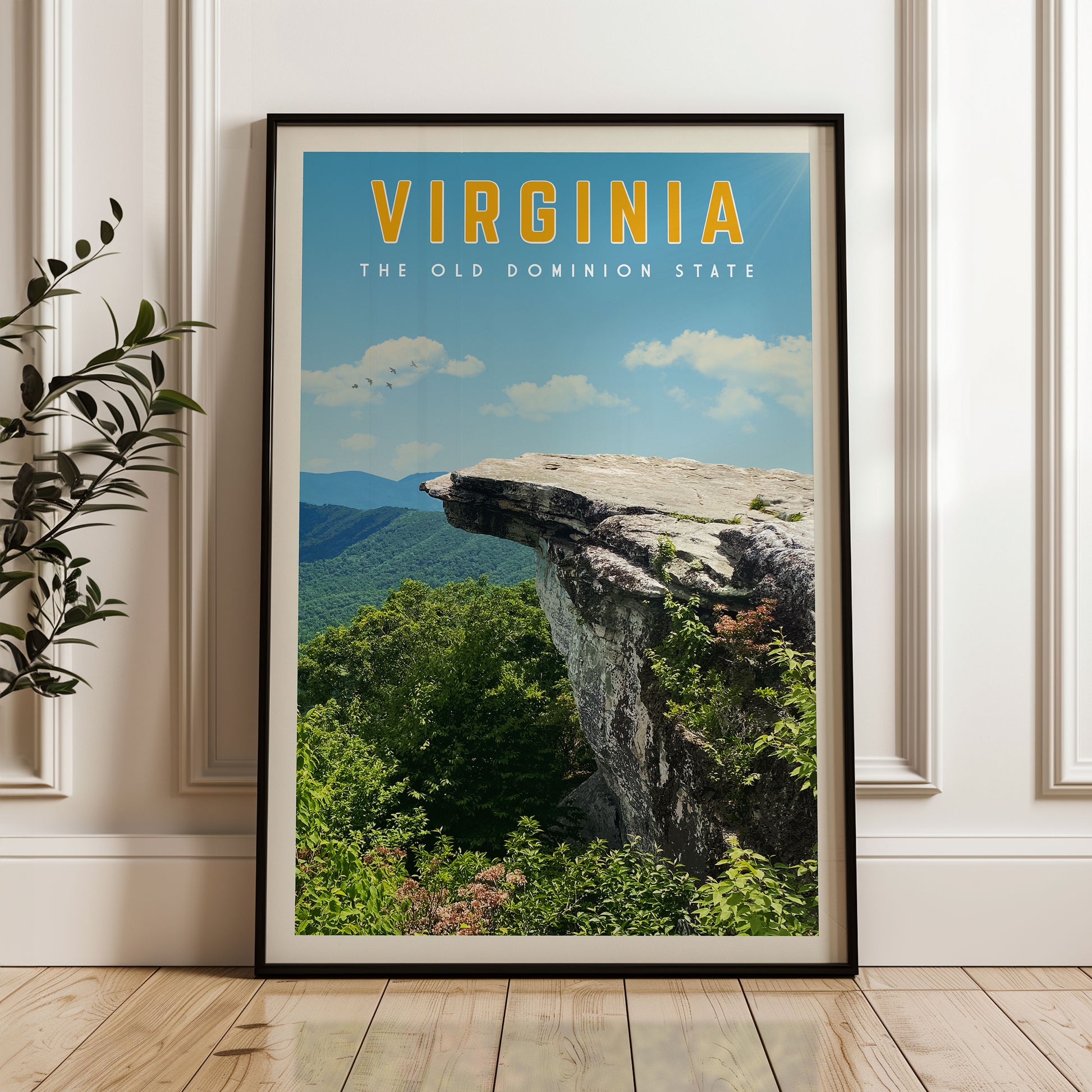 A framed poster of a scenic landscape with mountains, trees, and a cliff in Virginia, with the text "VIRGINIA THE OLD DOMINION STATE" prominently displayed.
